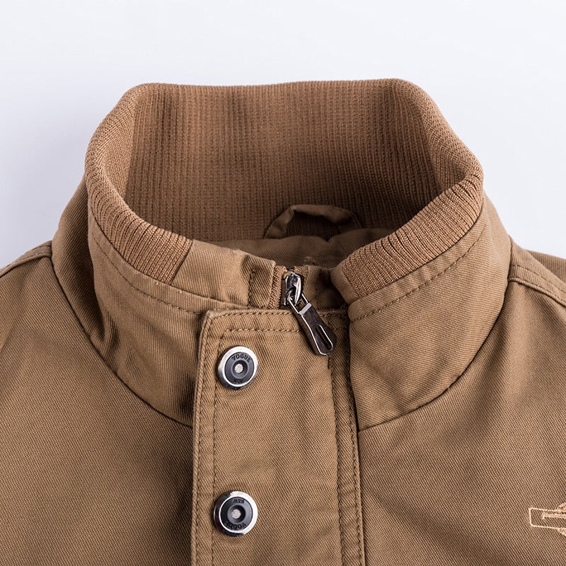 Close-up of the collar and zipper of a stylish military Air Force jacket for men in a trendy brown color.
