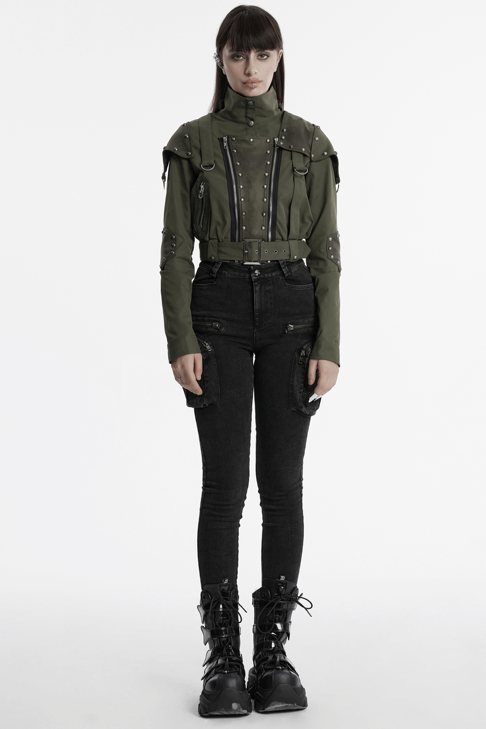 Punk military style short jacket with distressed rivets and adjustable collar, paired with black skinny jeans.