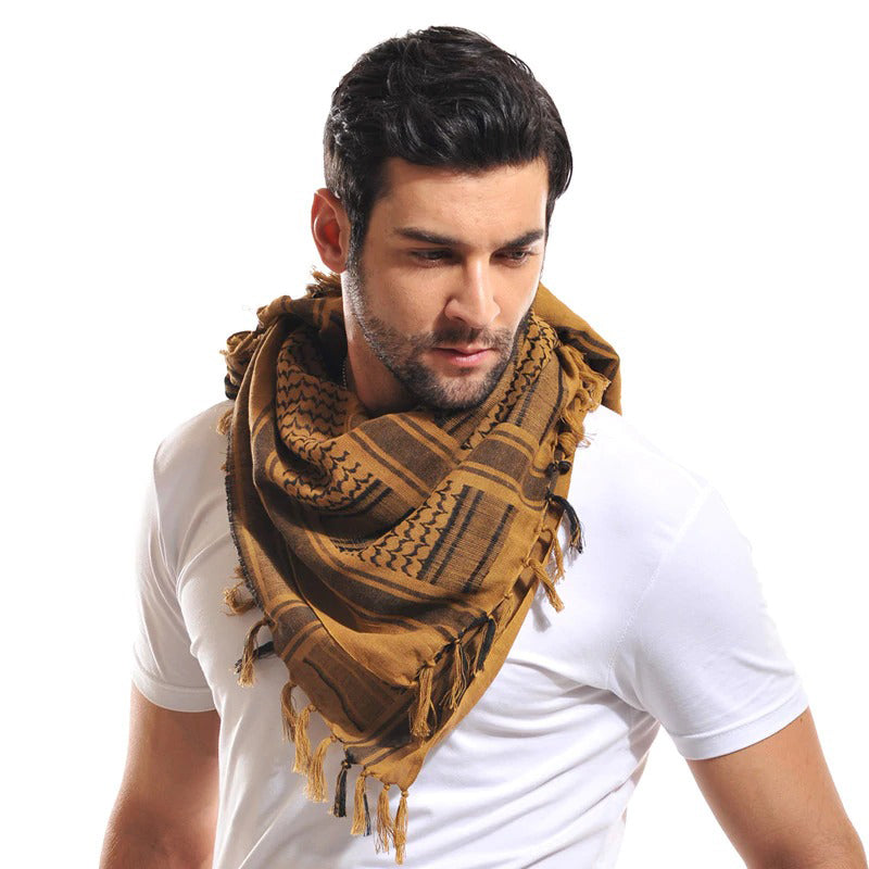 Military Tactical Shemagh worn by a model, showcasing desert style and versatility for outdoor activities.
