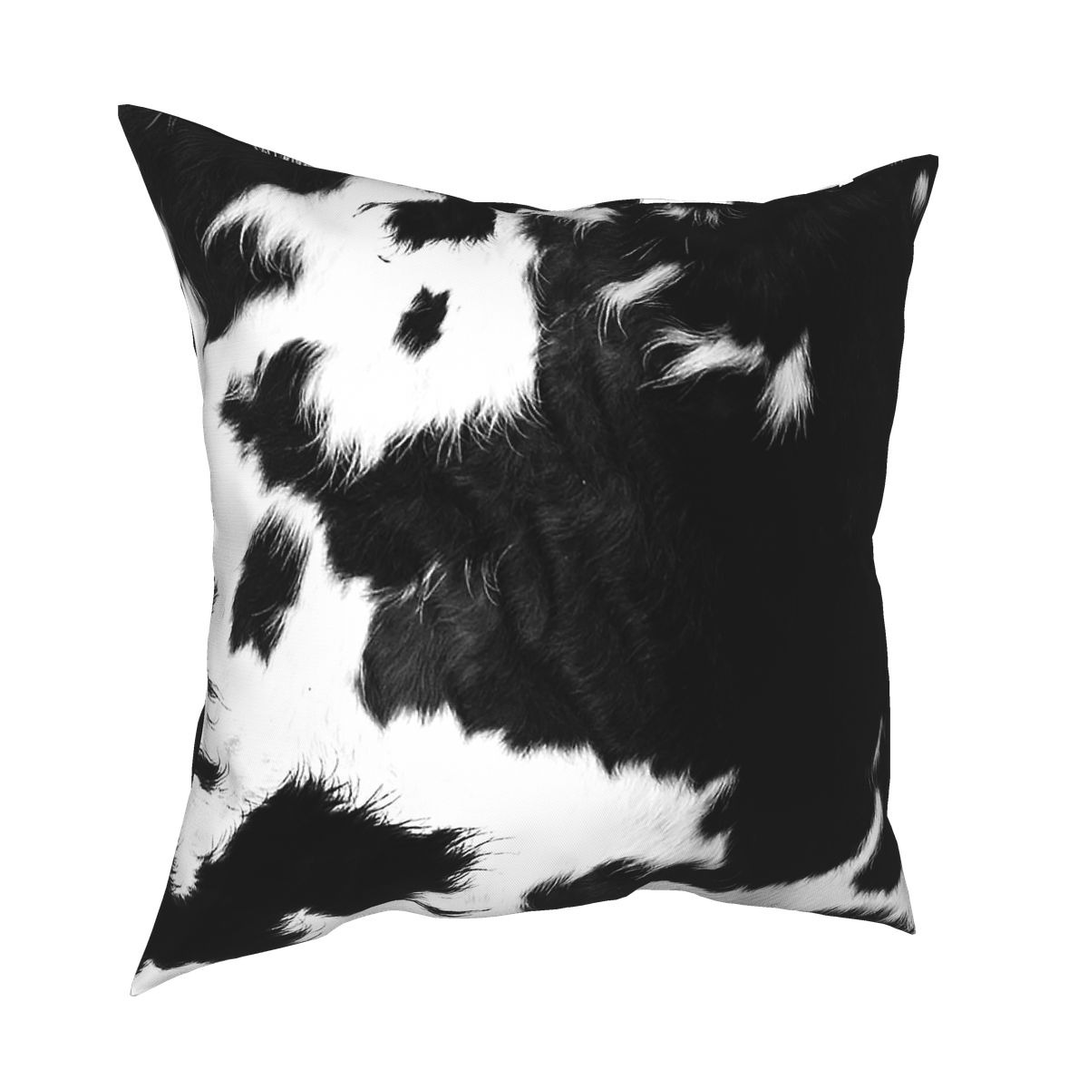 Modern black and white cowhide pillow, stylish home decor with soft texture and trendy cow print.