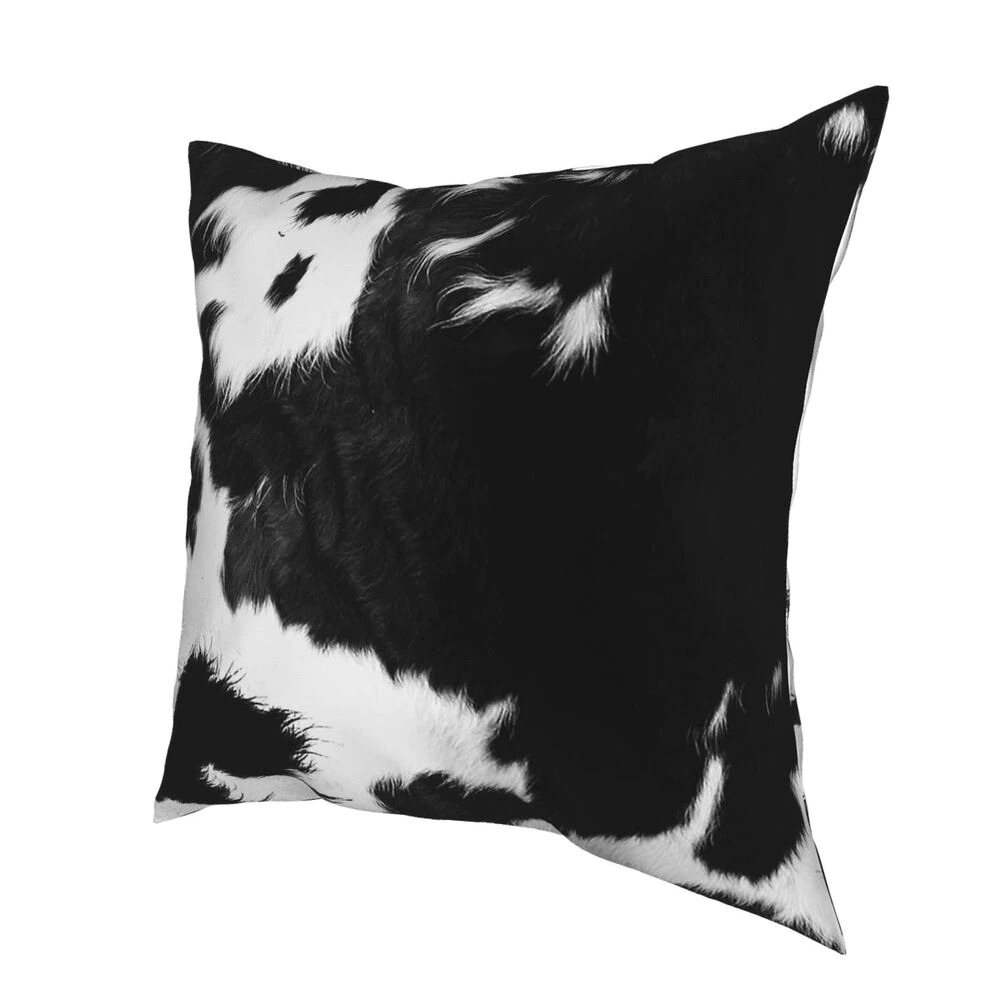 Modern black and white cowhide pillowcase, perfect for creative home decor and a stylish gift.