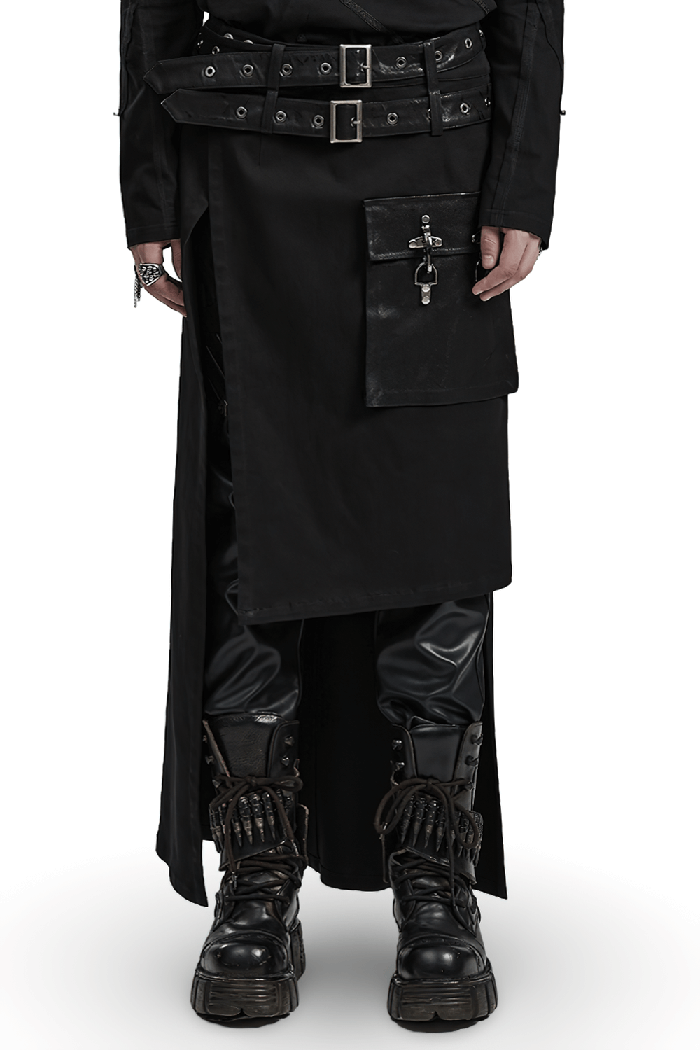 Modern punk utility kilt featuring pockets and detachable loops, styled with edgy boots and sleek trousers.