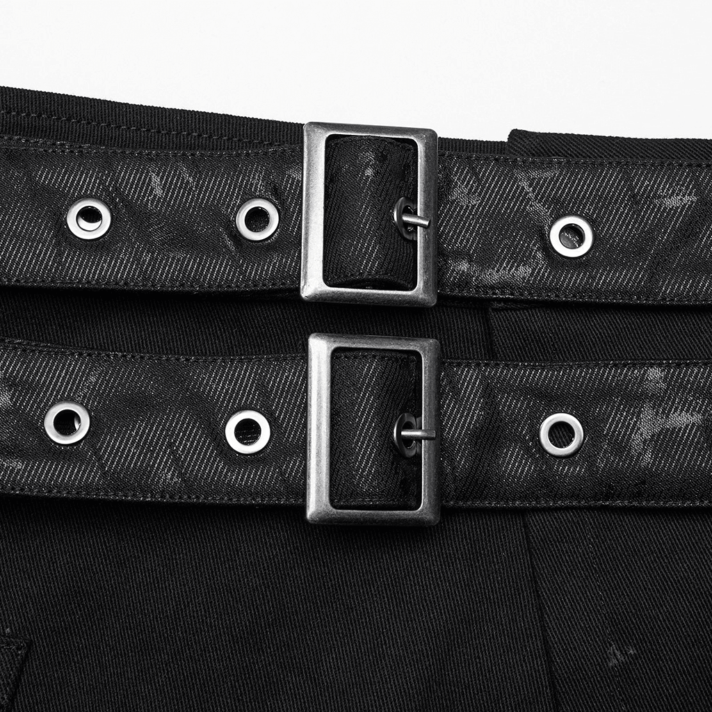 Close-up of black utility kilt belt featuring two buckles and grommets for adjustable fit and added style.