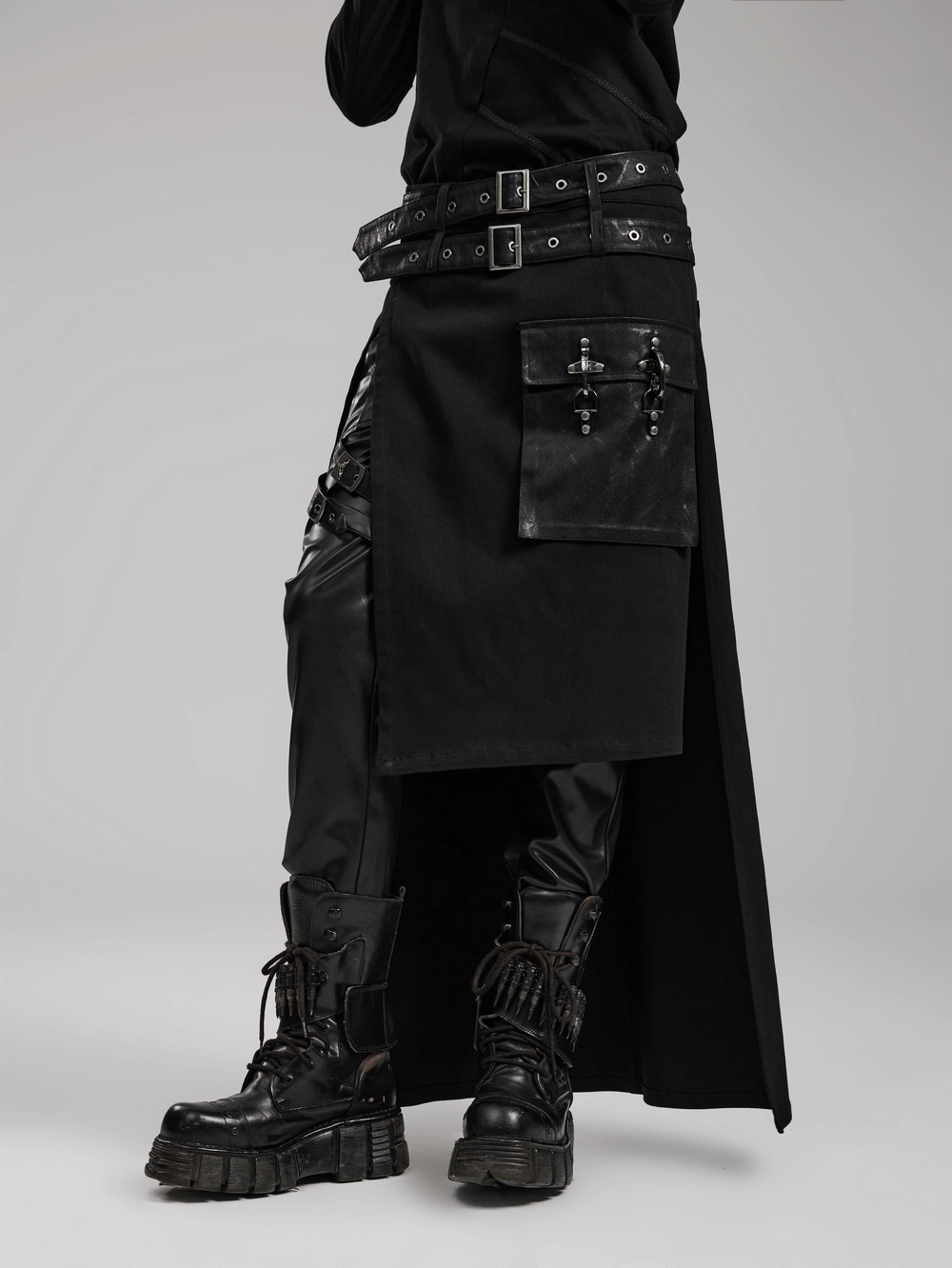 Modern punk utility kilt with pockets, detachable loops, and stylish boots, showcasing edgy fashion essentials.
