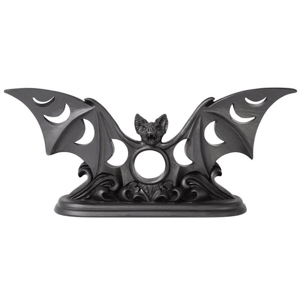Moon phases bat tea light candle holder for gothic decor, casting eerie shadows and adding a mystical touch to your home.