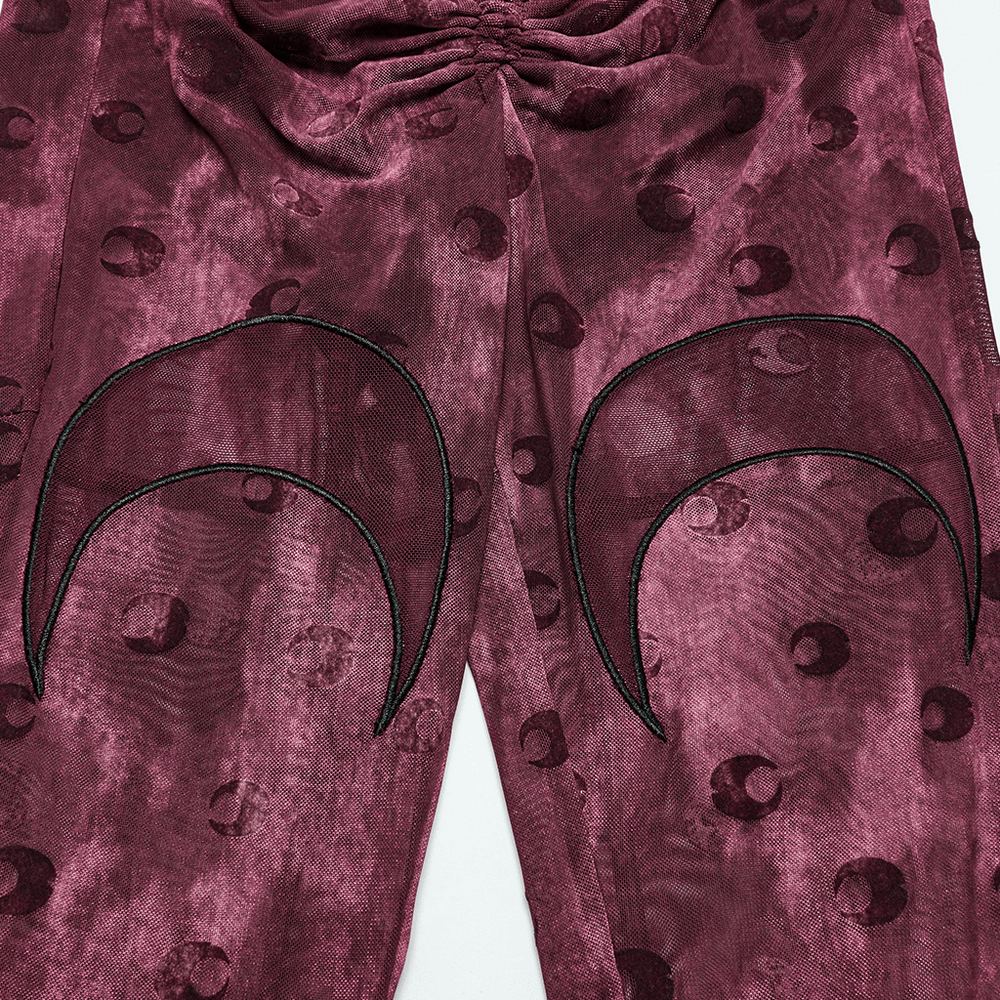 Moon printed mesh flare pants featuring crescent embroidery, perfect for cosmic and stylish outfits.