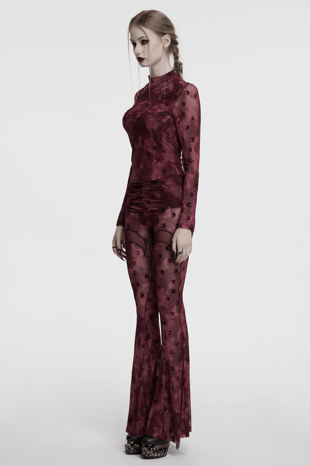 Chic moon printed mesh flare pants with crescent embroidery, stylish and modern design for a trendy look.