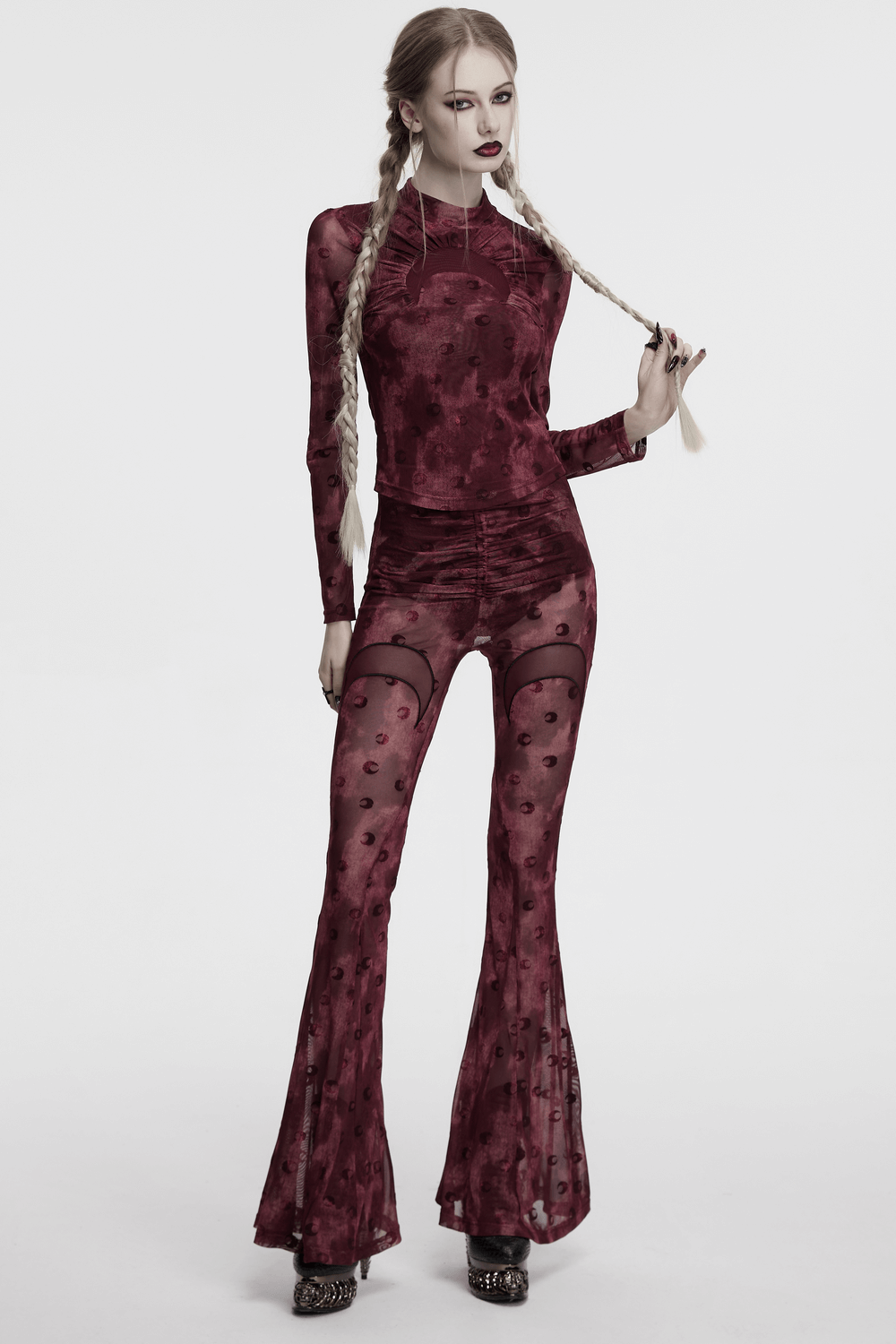 Moon printed mesh flare pants with crescent embroidery, featuring a stylish burgundy design and unique details.