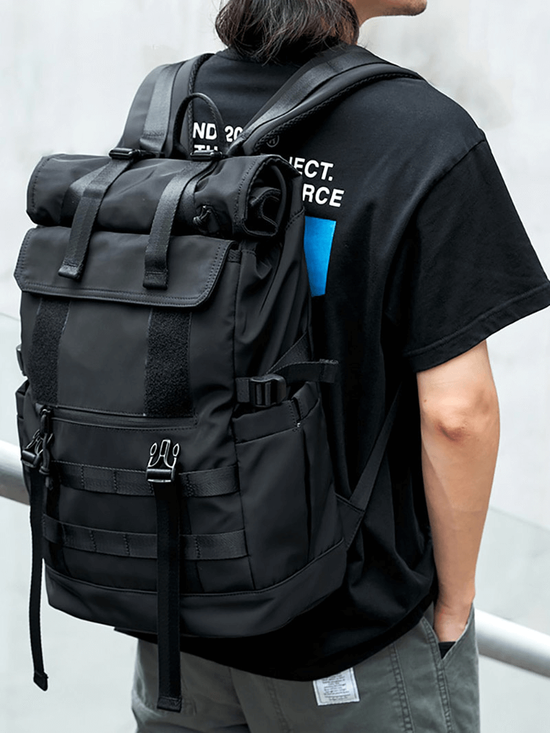 Stylish unisex motorcycle waterproof backpack worn by a person, showcasing its sleek design and urban appeal.