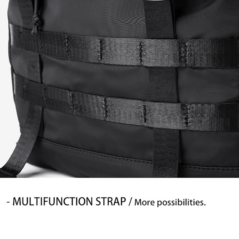 Close-up of multifunction strap on a waterproof motorcycle backpack, showcasing versatility for outdoor adventures.