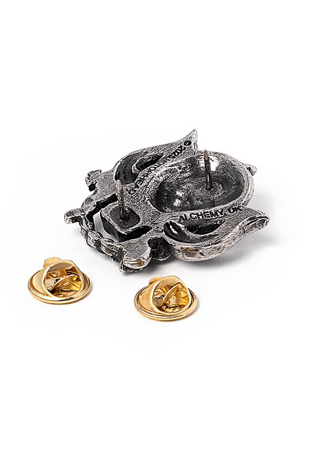 Back of Motorhead Warpig pin badge showing details and pin fasteners, perfect for rock fans and collectors.