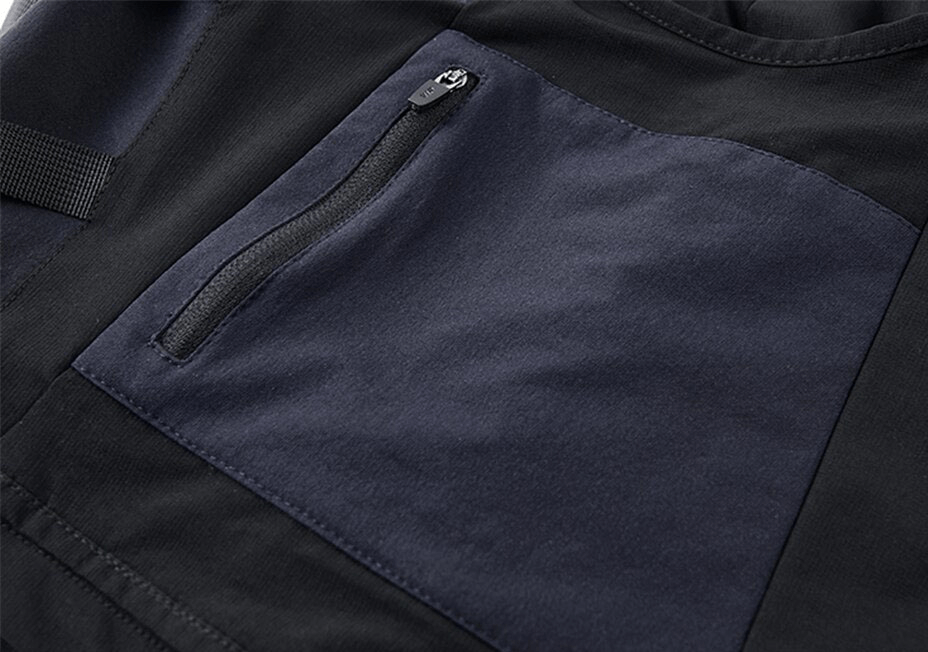 Close-up of tactical cargo shorts pocket showcasing stylish zipper detail and durable fabric.