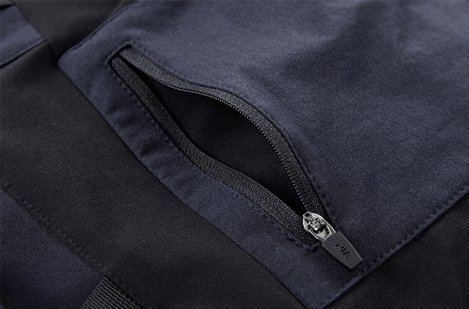 Close-up of zipper pocket on multi pockets ribbons tactical cargo shorts for added style and functionality.