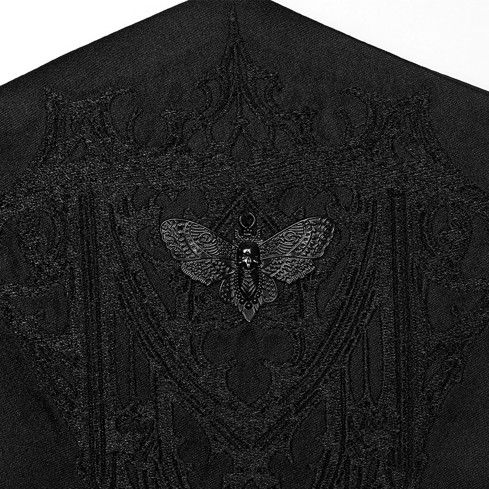 Alt Tag: Mysterious Waist Corset Belt with Moth Pendant, black goth church embroidery close-up with moth skull charm centerpiece