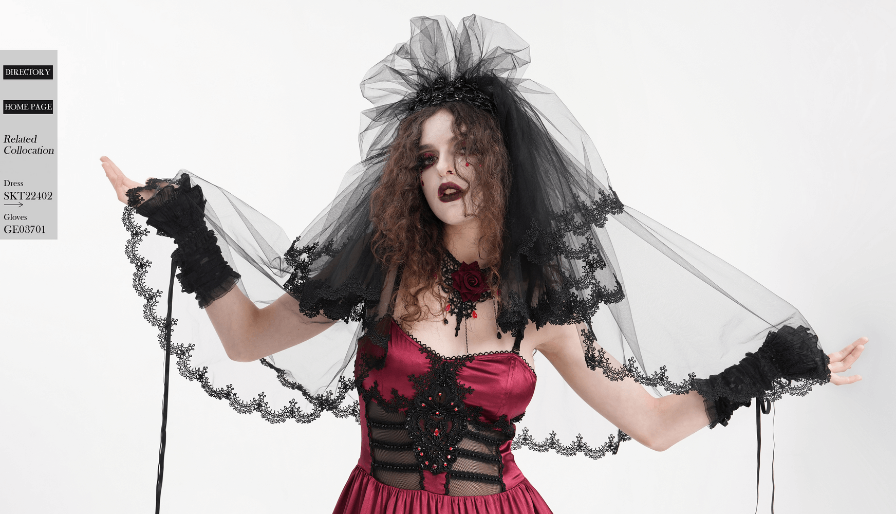 Chic model showcasing a stunning black lace bridal veil paired with a red gown, exuding elegance and mystery for weddings.