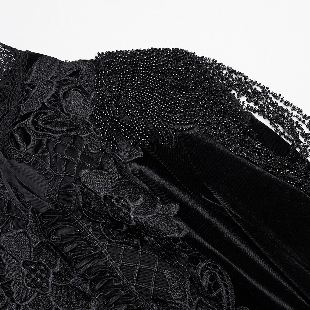 Detail of the Mystery Long Black Velvet Lace Dress with Fishtail Hem, showcasing intricate lace and beading.