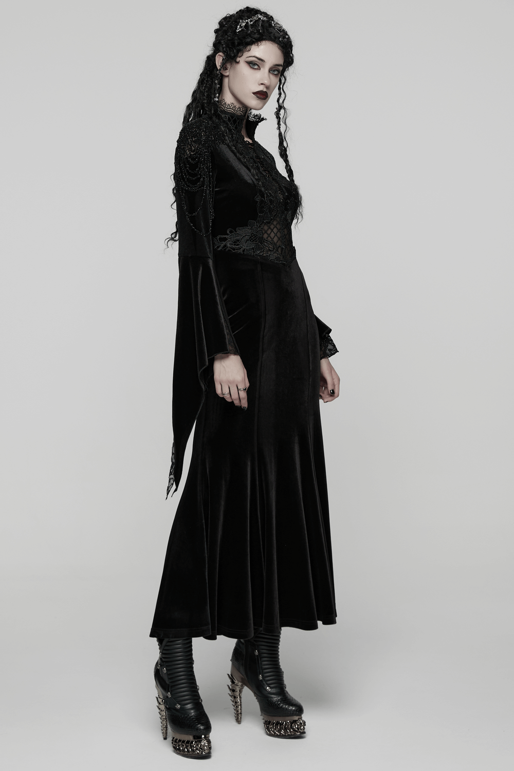 Mystery Long Black Velvet Lace Dress with Fishtail Hem showcased on a model, featuring flared sleeves and elegant lace details.