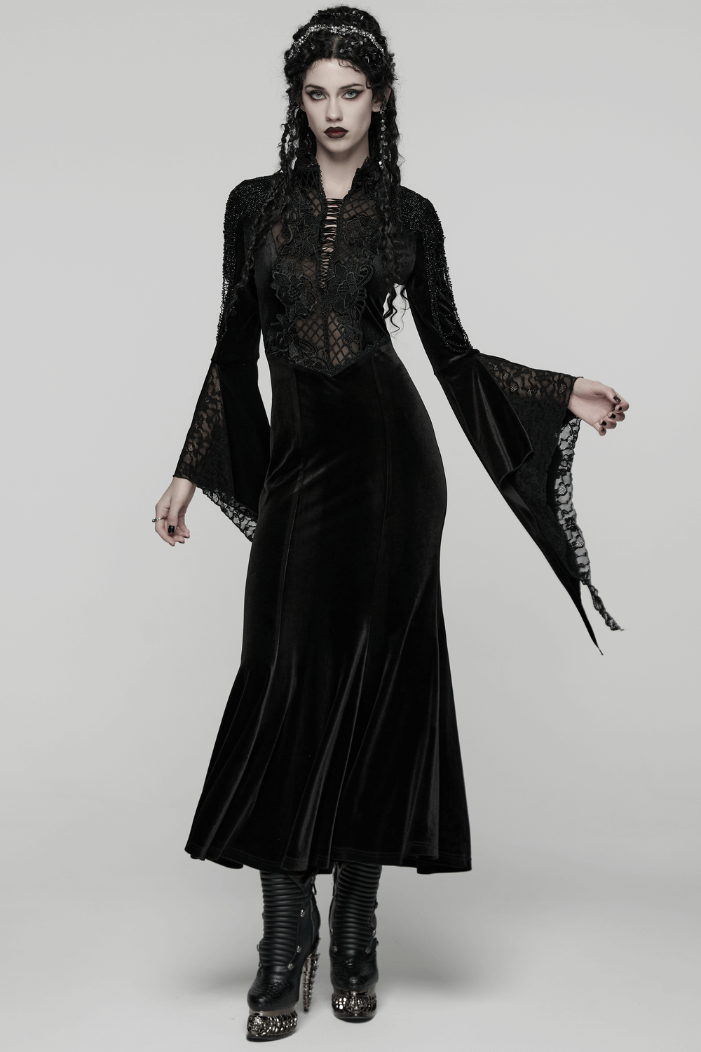 Mystery Long Black Velvet Lace Dress with Fishtail Hem worn by model showcasing its gothic elegance and flared sleeves.