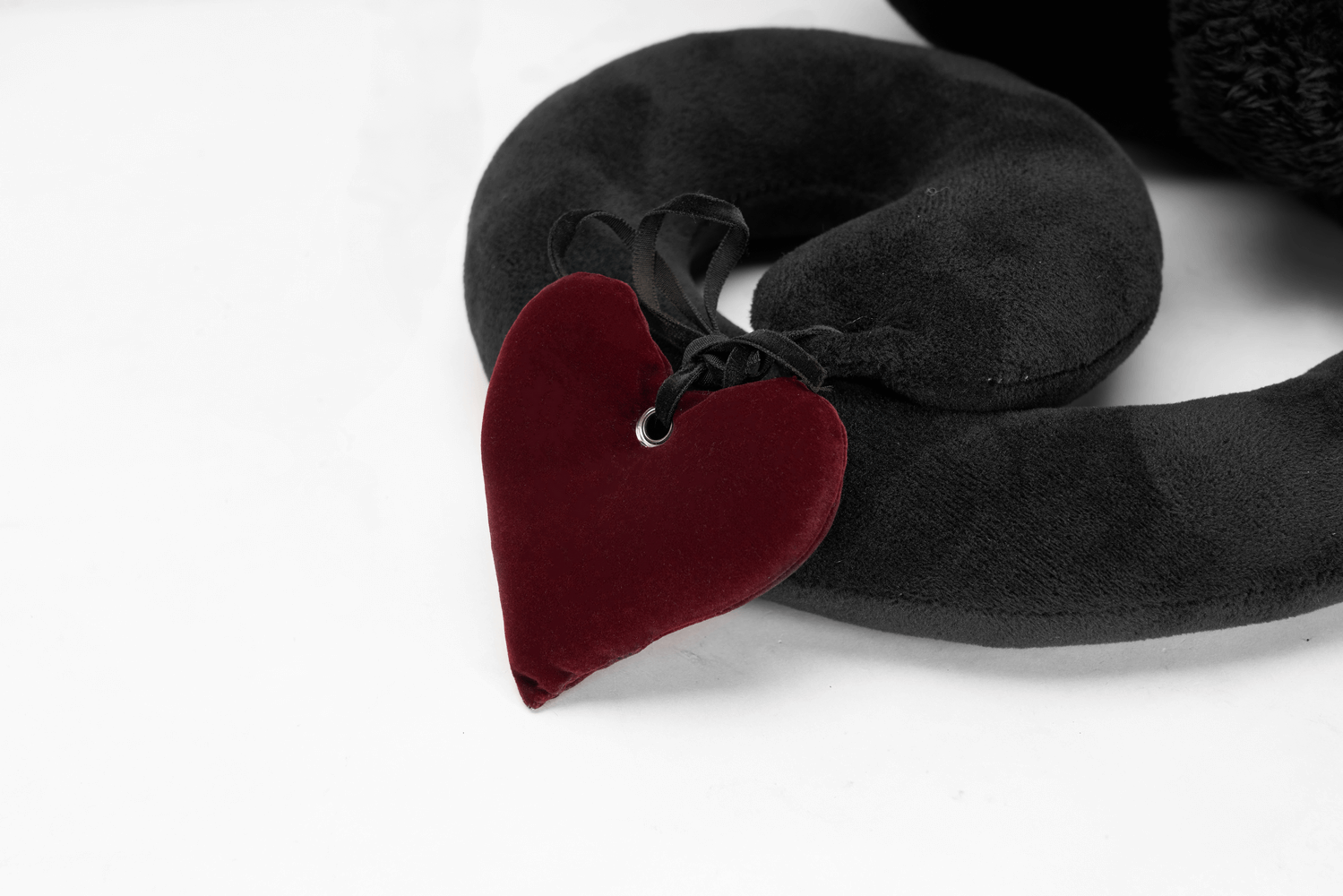 Detachable red velvet heart pendant for a gothic black cat plush toy.