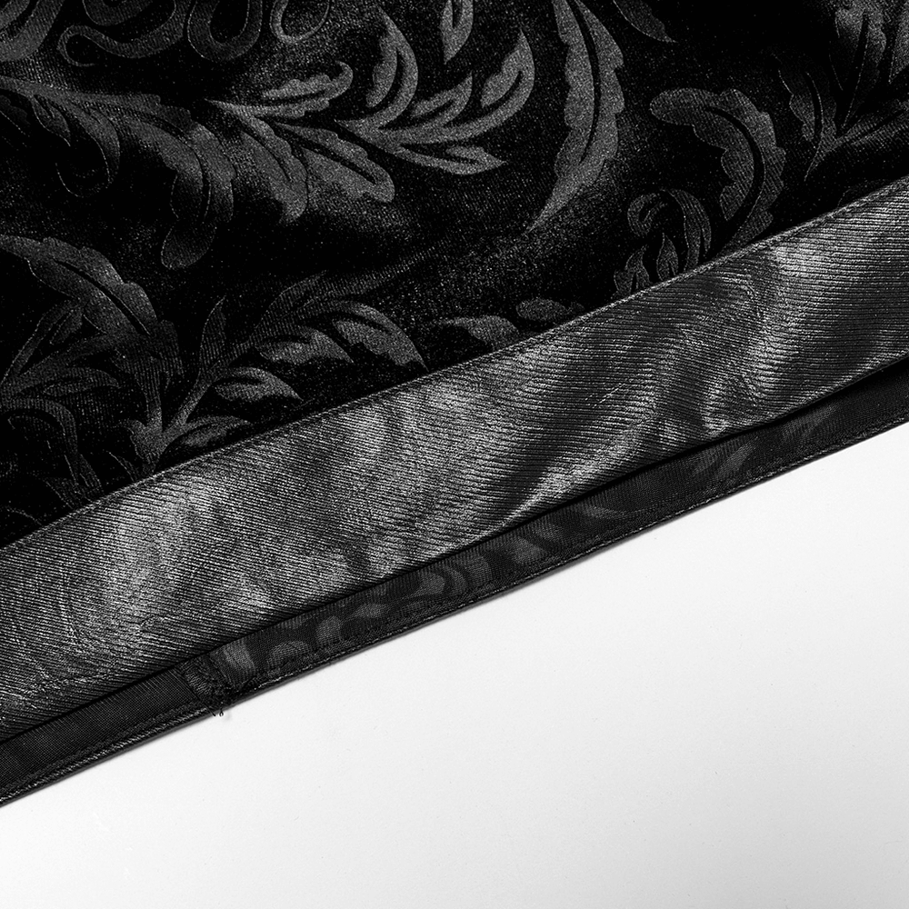 Close-up of the Mystic Hooded Velvet Cape showcasing the embossed Gothic velvet and sleek faux leather trim.