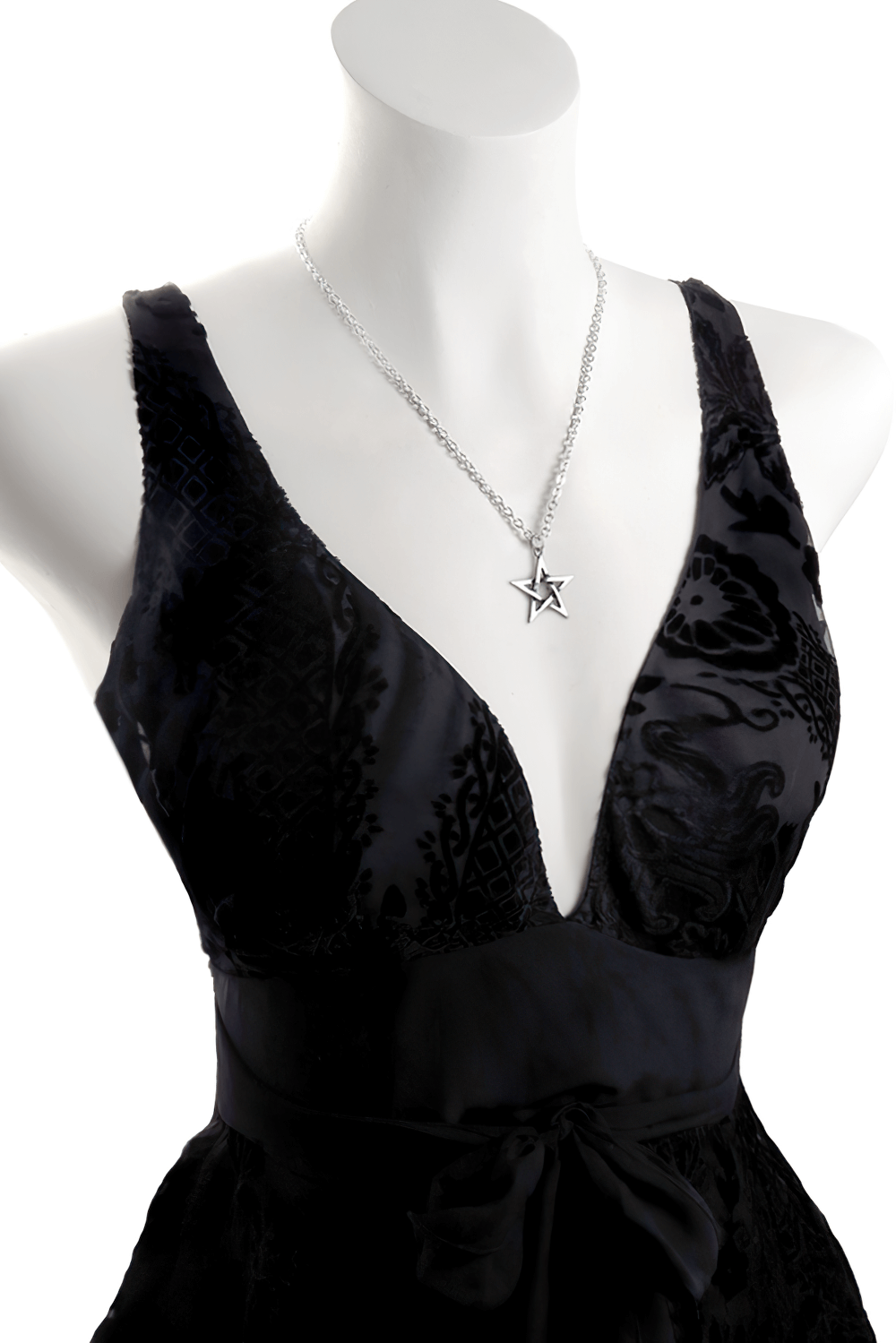 Elegant black dress featuring a mystical pentagram pendant, symbolizing cosmic balance and elemental powers.