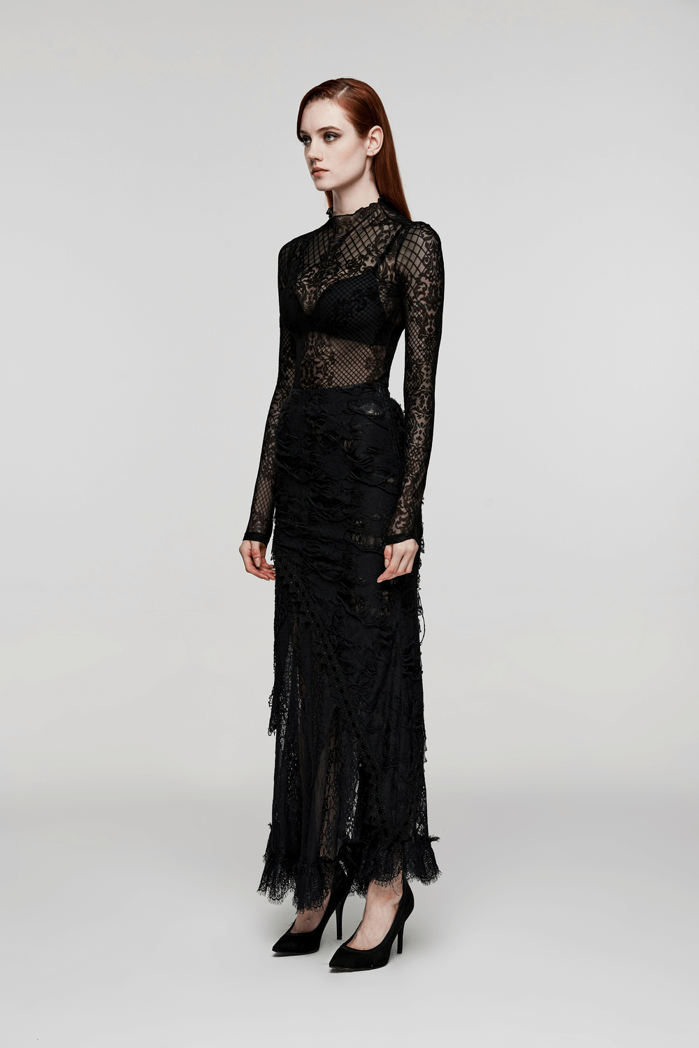 Elegant black lace dress with long sleeves and a fitted silhouette, showcasing gothic charm and sophistication.