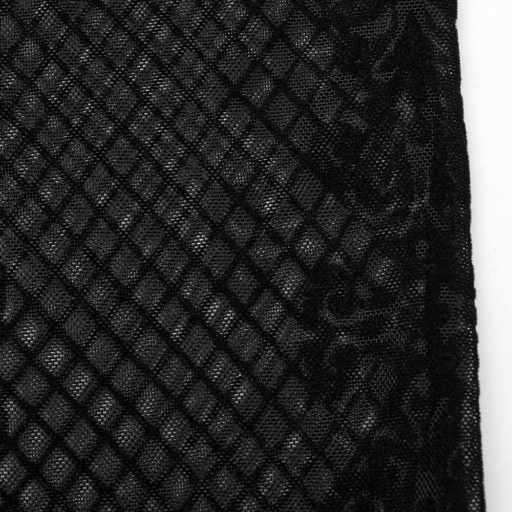 Close-up of mystical black flocked mesh fabric showcasing intricate gothic patterns in a diamond mesh design.
