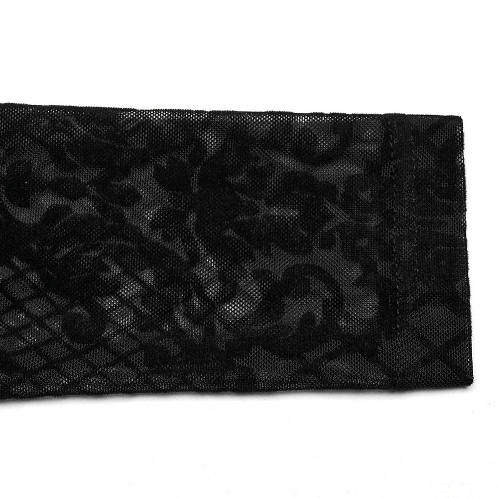 Close-up of black flocked mesh fabric with intricate gothic pattern, perfect for elegant designs.