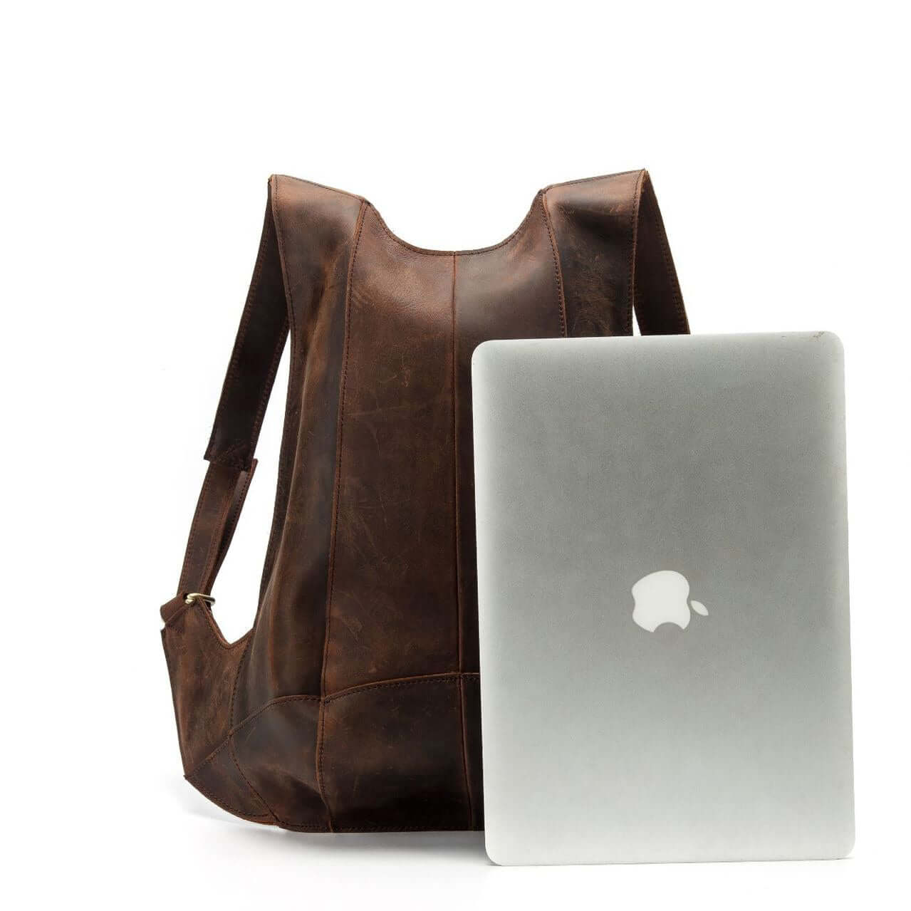 Natural leather backpack for women, anti-theft vintage bag with laptop for safe travel.