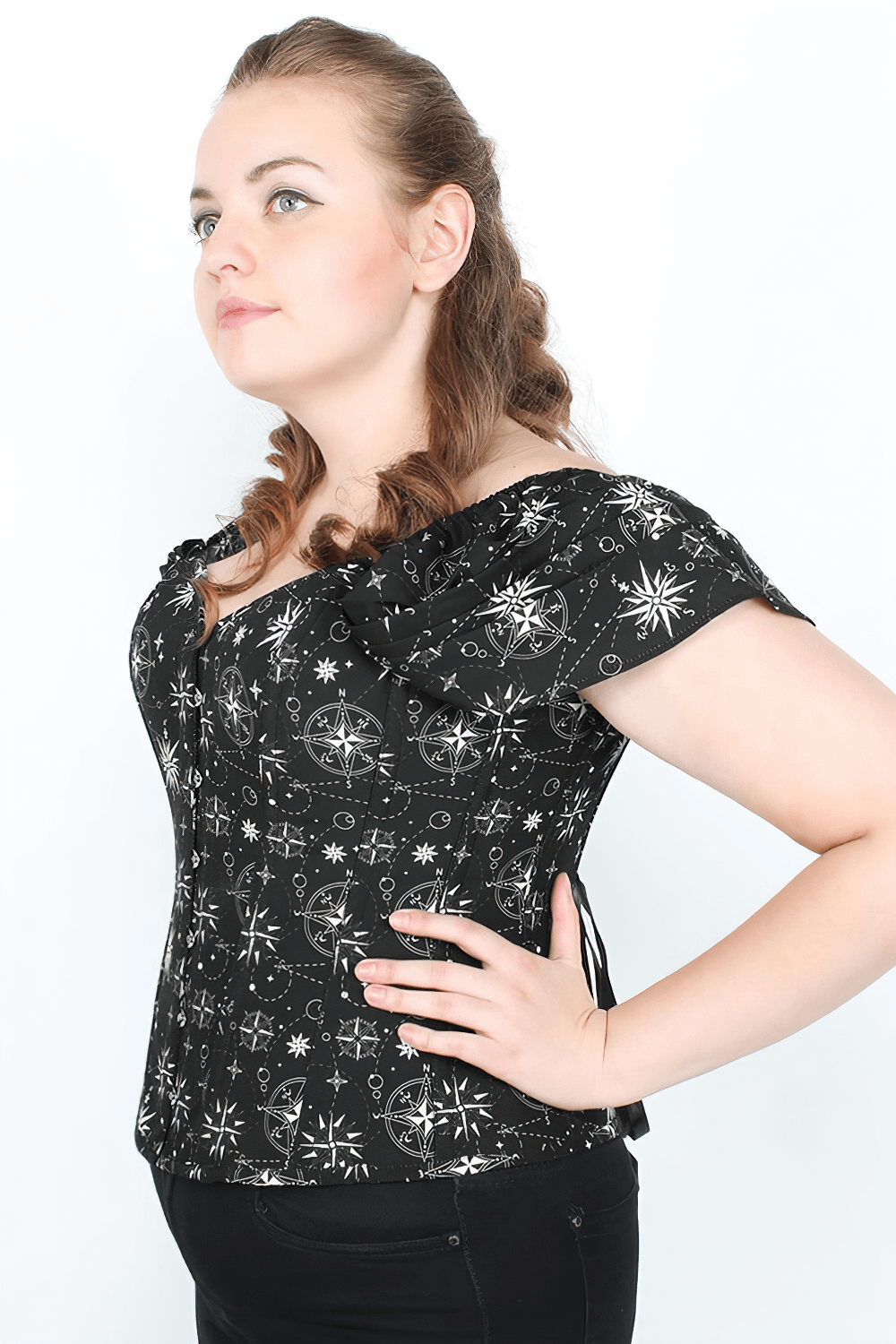 Nautical print corset top with off-shoulder sleeves, vintage-inspired style featuring celestial design and flattering fit.