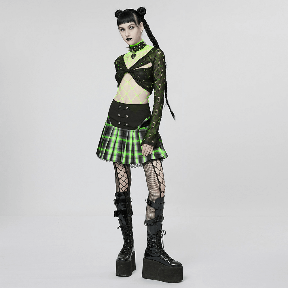 Edgy punk fashion featuring a model in a neon green mesh bodysuit, black mini skirt, and bold platform boots.