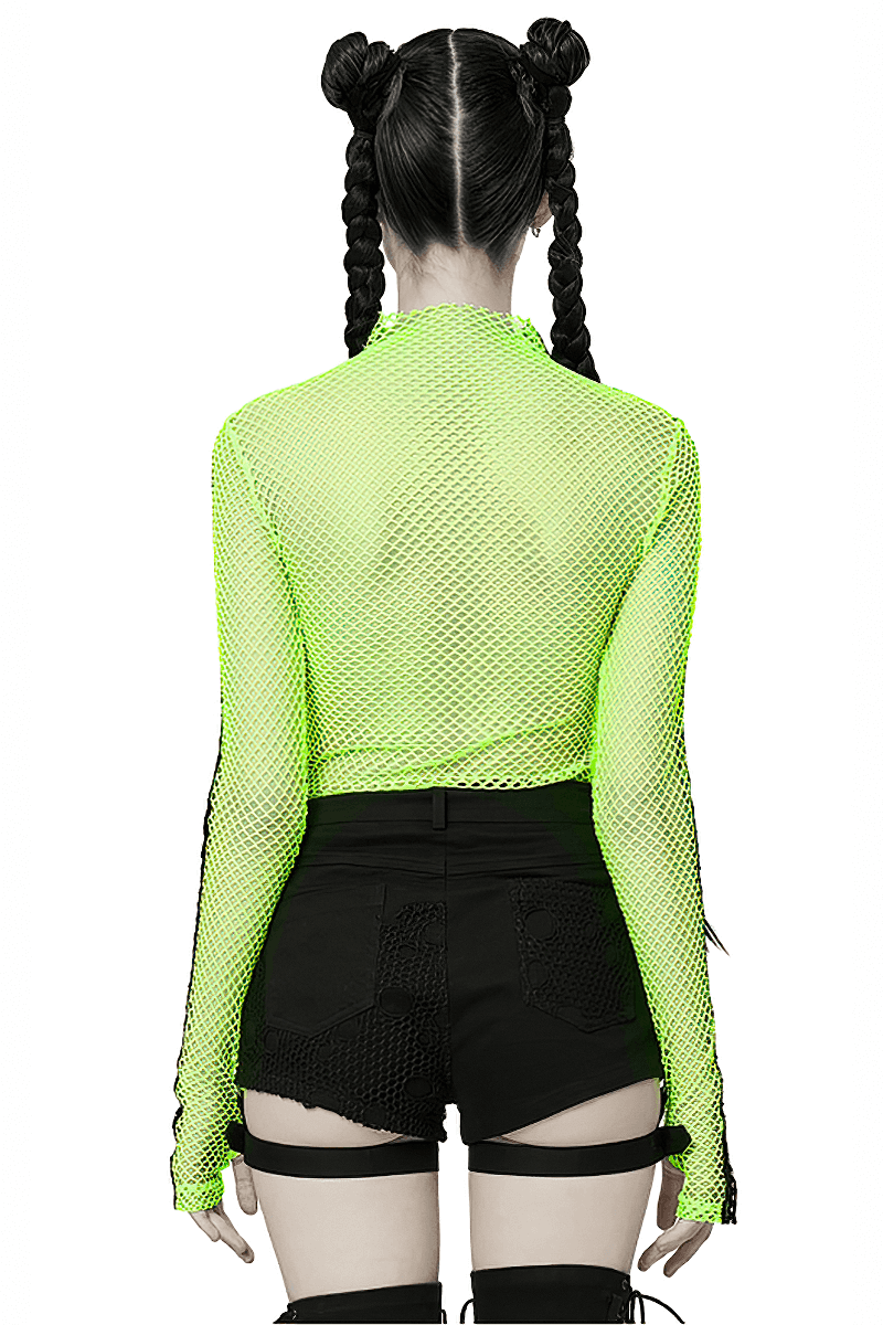Back view of a neon-green openwork goth top, featuring long sleeves and paired with black shorts.