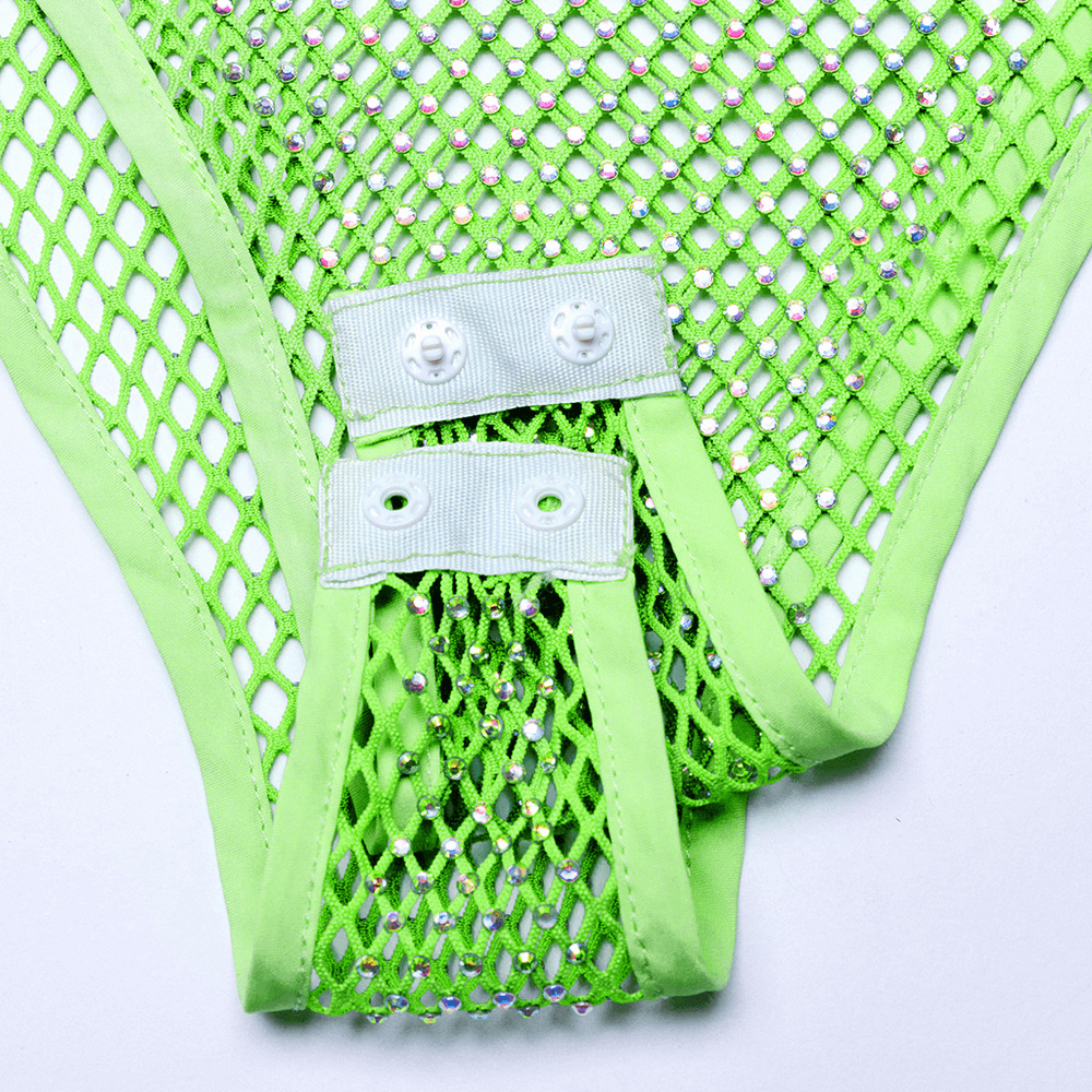 Close-up of neon mesh bodysuit with rhinestones and detachable straps, showcasing cyberpunk fashion details.