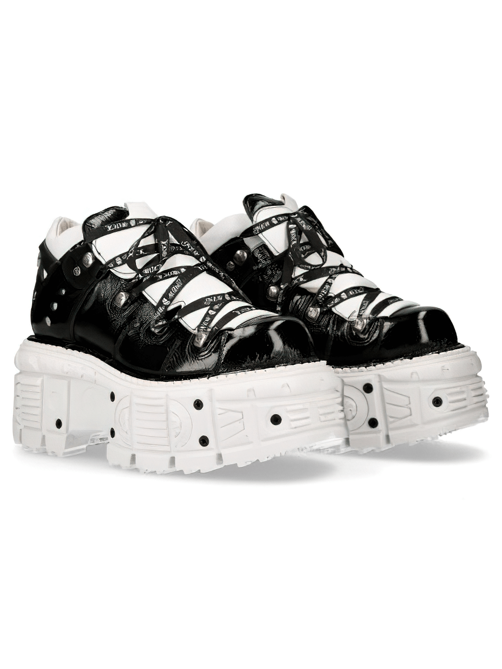 NEW ROCK black and white platform rock boots with laces, featuring chunky soles and a stylish two-tone leather design.