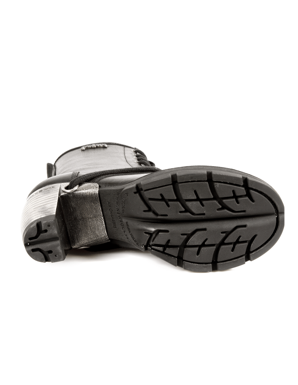 Sole of NEW ROCK black ankle boots featuring a textured tread for durability and grip.