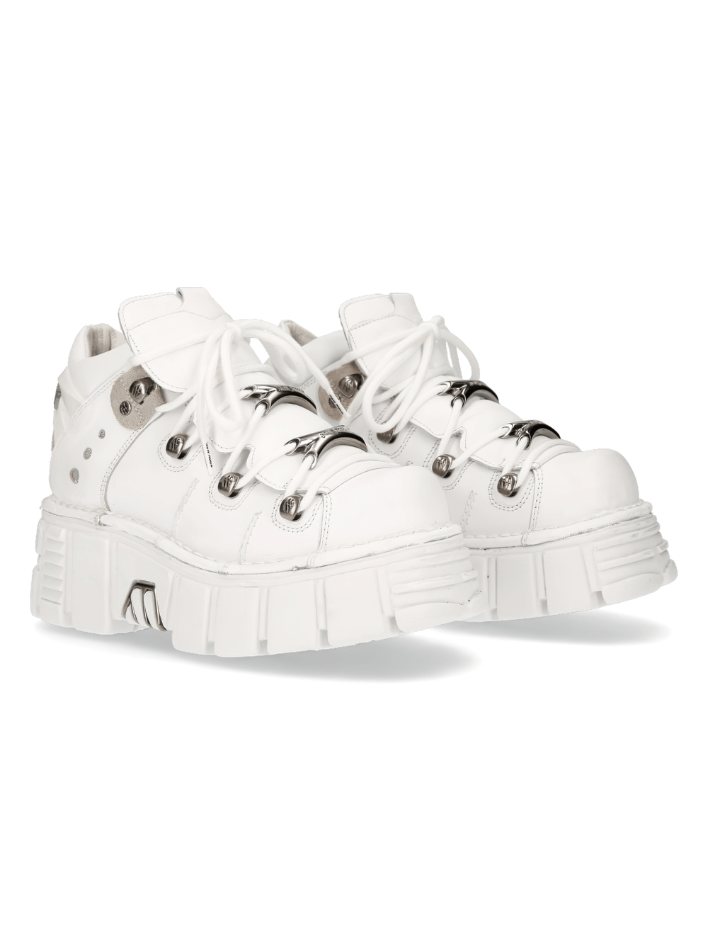 Stylish white platform sneakers with metallic details, perfect for a punk-inspired look.