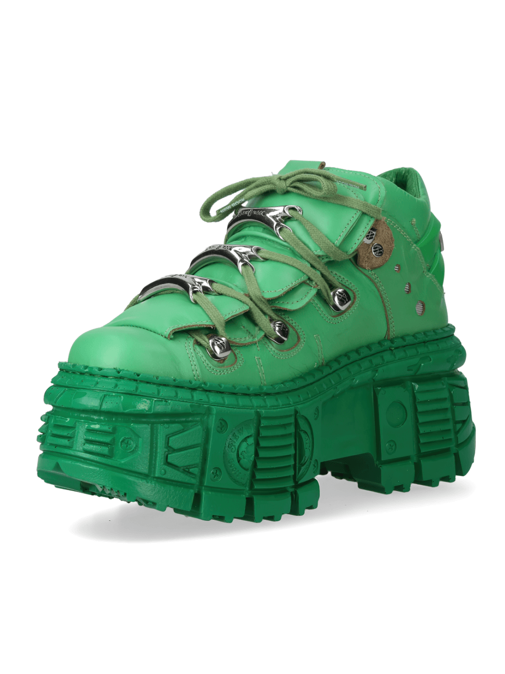 Stylish green ankle boots with a bold rock-inspired design and chunky sole detail, perfect for making a fashion statement.