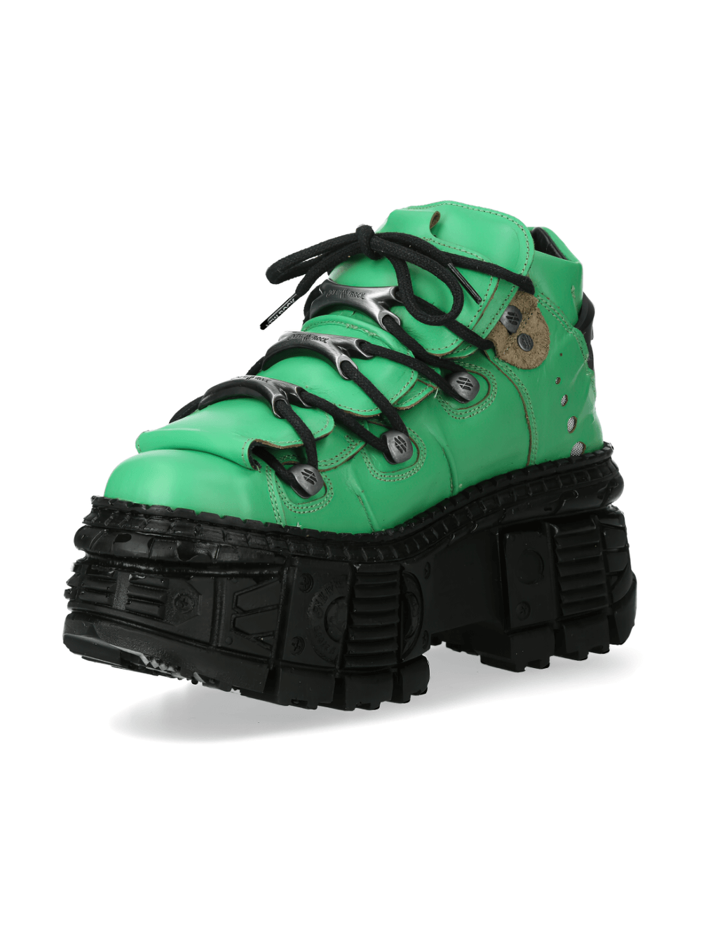 Stylish green platform ankle boots with rocker design and durable black sole, perfect for making a bold fashion statement.