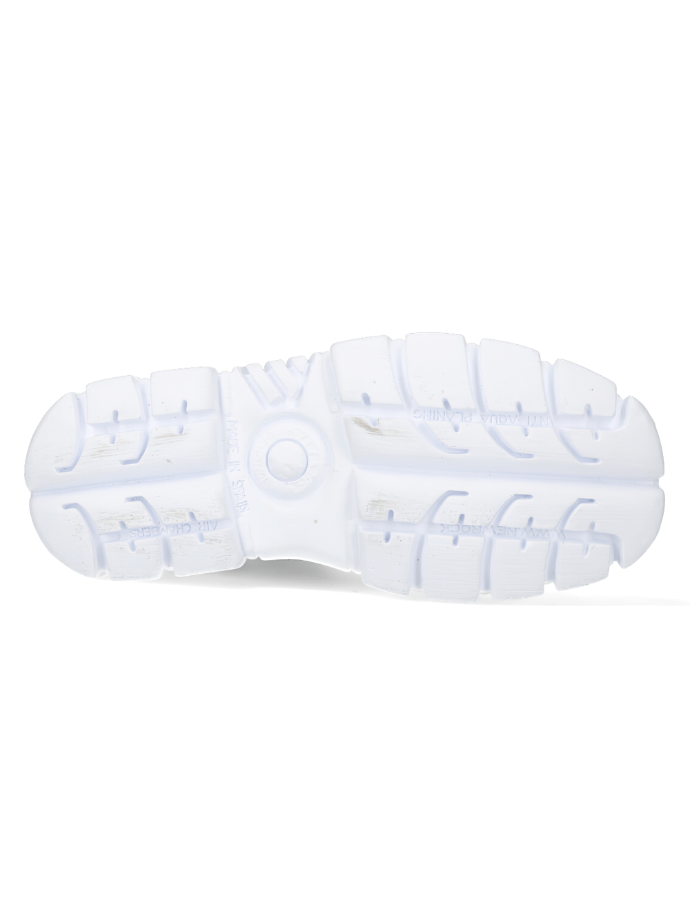 Bottom view of white sneaker sole showcasing rugged grip and durable design.