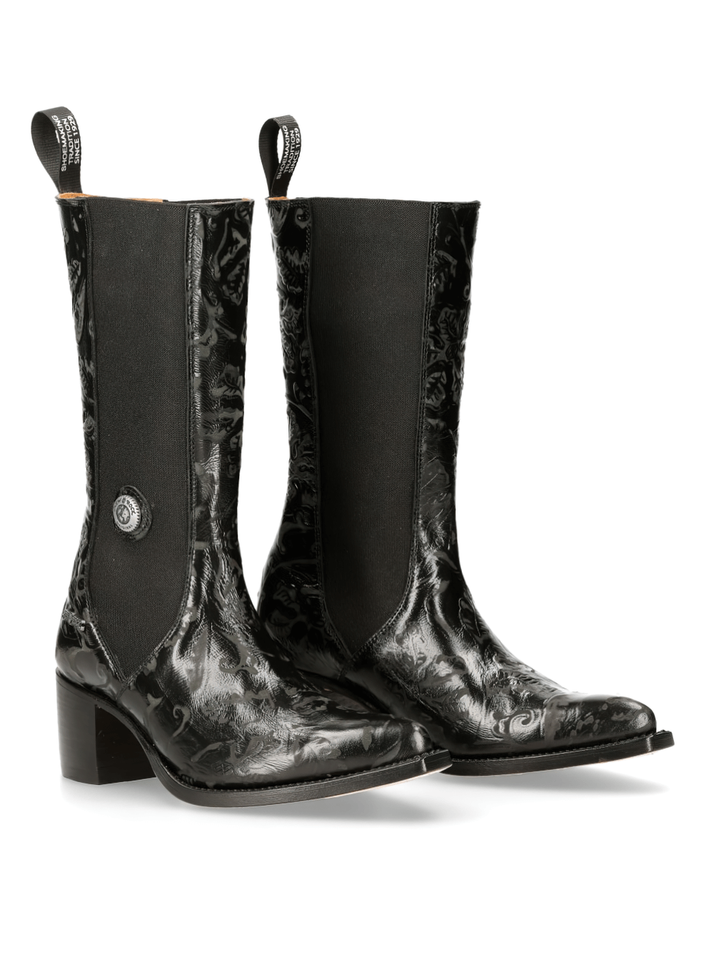 Stylish black Western elastic boots with metallic detail and sturdy heels, perfect for a chic Wild West look.