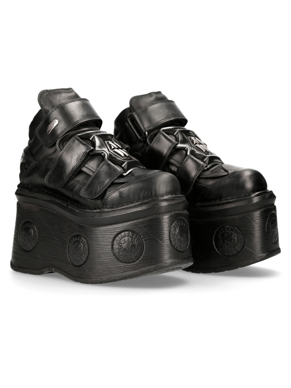 NEW ROCK black leather ankle boots with velcro closure and unique coin sole detail for a bold gothic look.