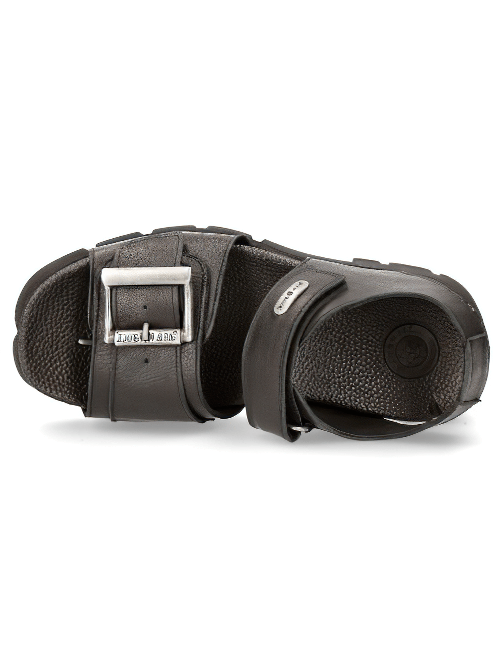 Heavy urban rock sandals with buckle and Velcro straps, featuring a durable sole and bold black design.