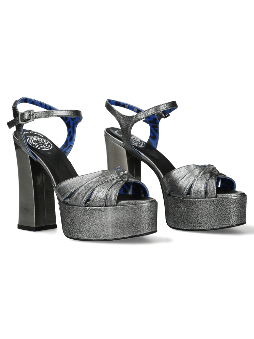 Chic silver platform block heel sandals with ankle straps and bold chunky heels for a stylish statement.