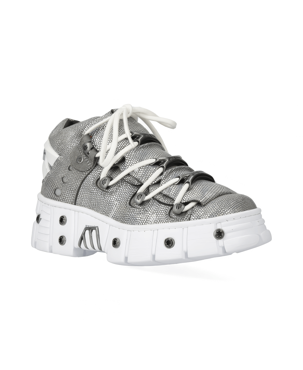Stylish silver lace-up sneakers with unique design and chunky sole, perfect for a bold fashion statement.