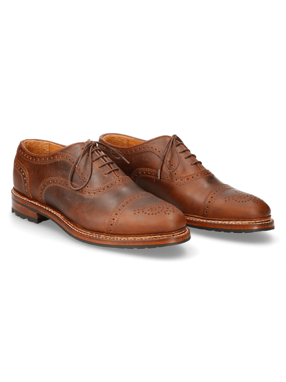 Stylish tan leather wingtip lace-up shoes from Newrock's WEST COLLECTION, designed for comfort and durability.