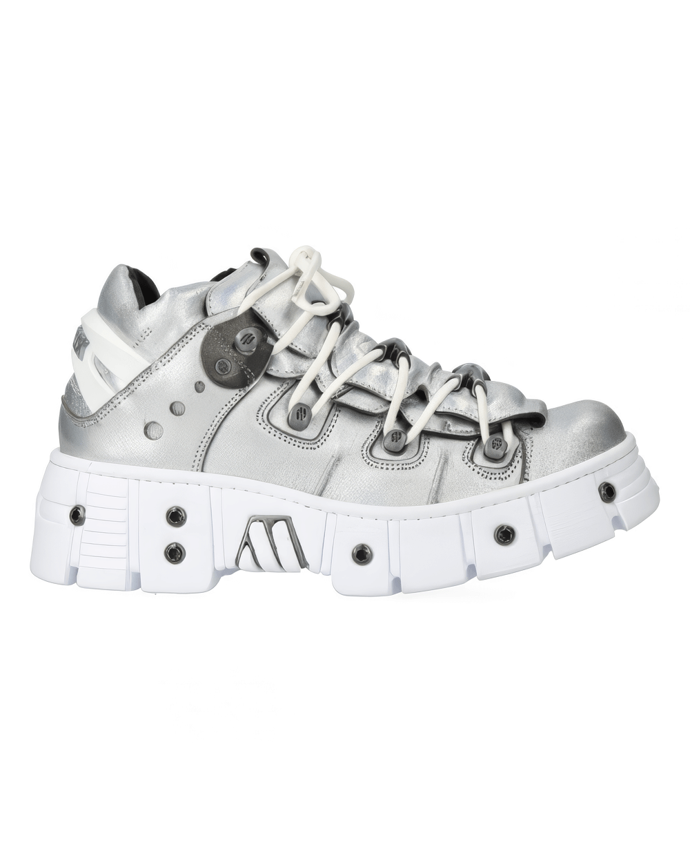 Stylish silver rock-inspired sneakers with unique design and chunky sole for a bold fashion statement.