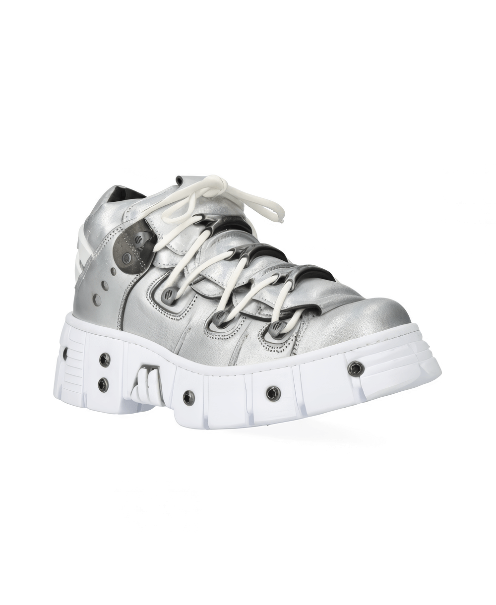 Stylish silver rock-inspired ankle boots with a chunky white sole and unique design for bold fashion statements.