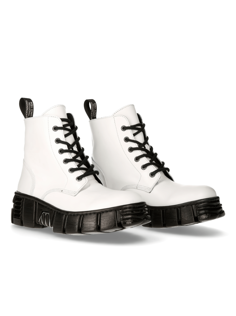 Stylish white urban ankle boots with black lace-up and chunky sole for a bold rock look.