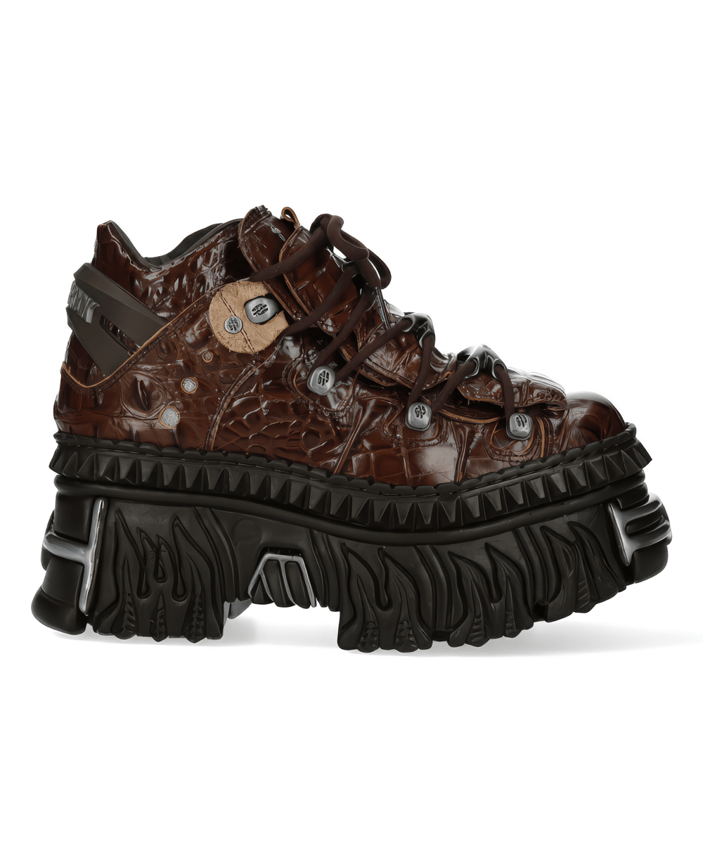 Stylish brown crocodile pattern shoes with chunky black outsole and unique lace-up design for edgy fashion.