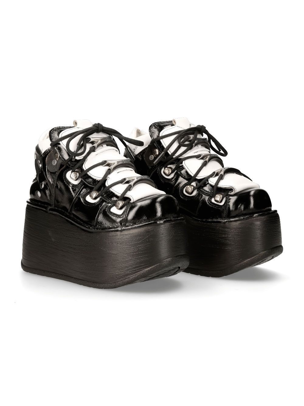 Gothic black and white platform ankle boots with lace-up closure and thick sole, perfect for punk fashion.